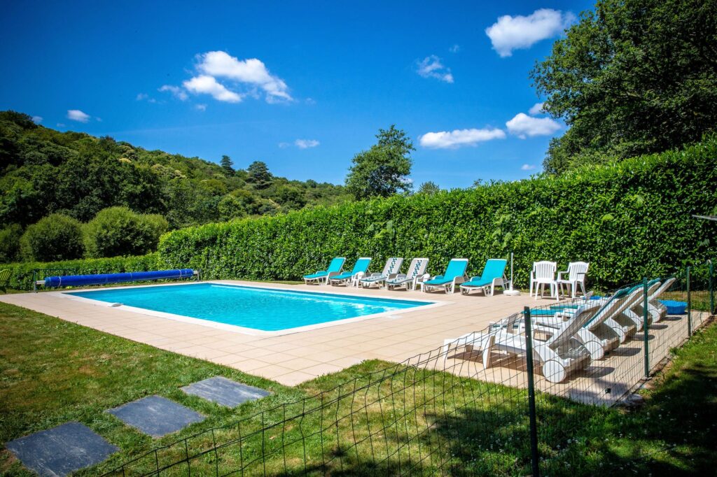 Our stunning private heated swimming pool with safety fence and alarm